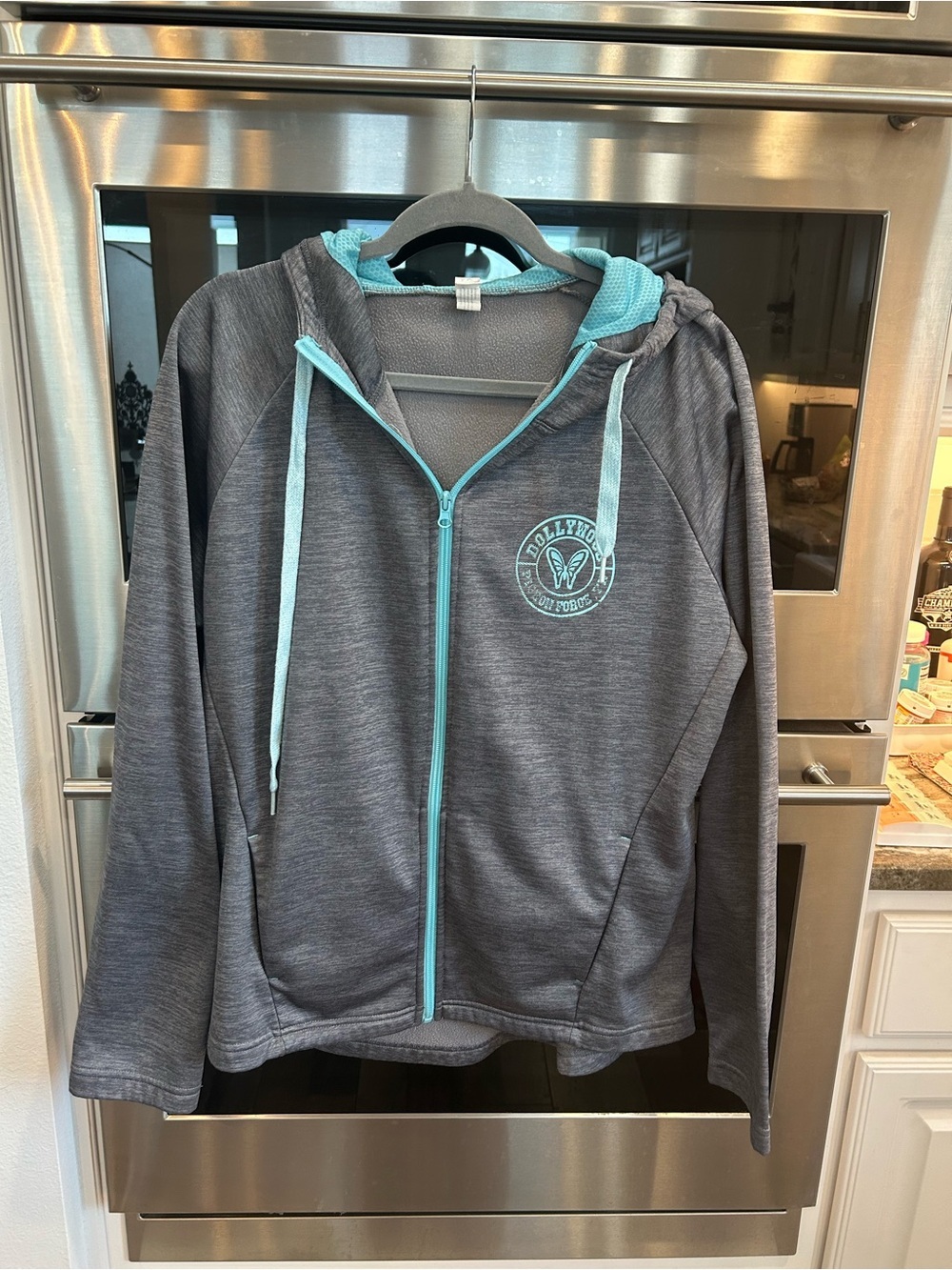 Dollywood Women's Gray Zip Hoodie with Teal Trim size XL has wear